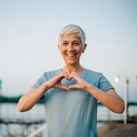 Chiropractic Salisbury NC Lady Making Heart Hands